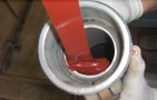 06 Pouring Epoxy Into Hose To Prepare For Blown-in Process | Credit - Nu Flow America